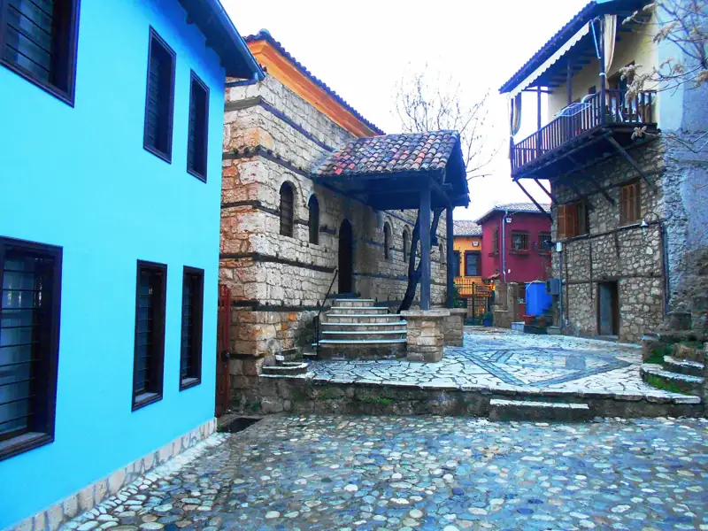 Colourful houses and cobblestones in the Jewish quarter of Barbouta